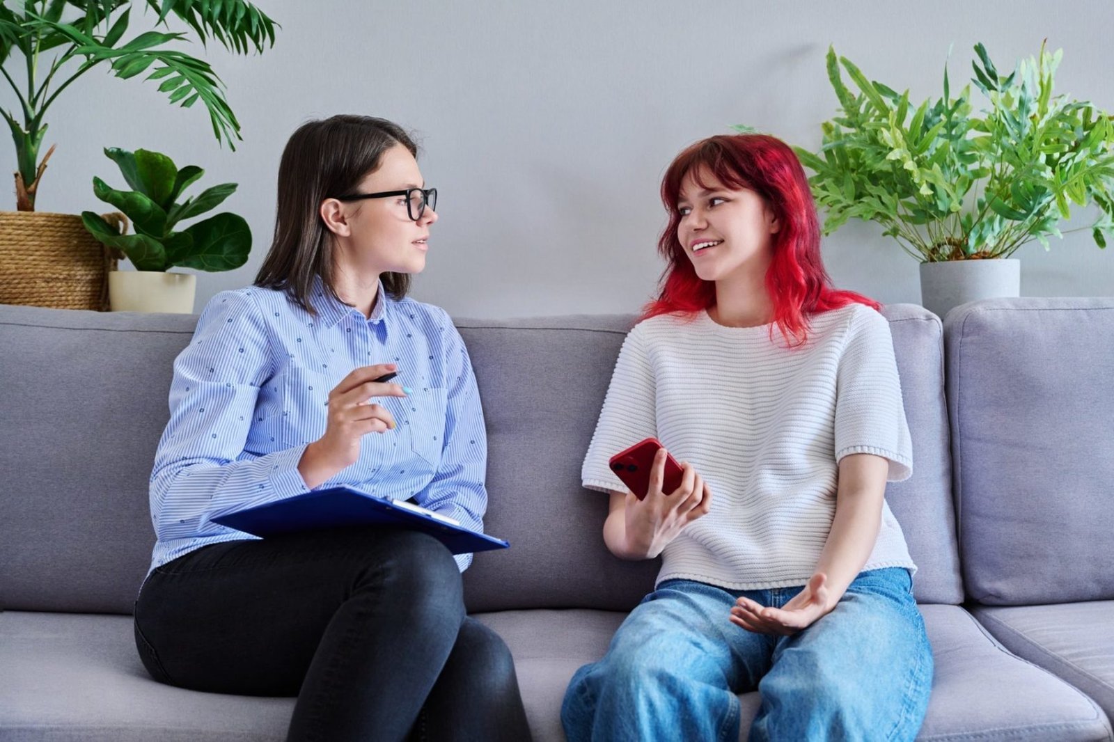 A psychologist in a one-to-one therapy session with a client